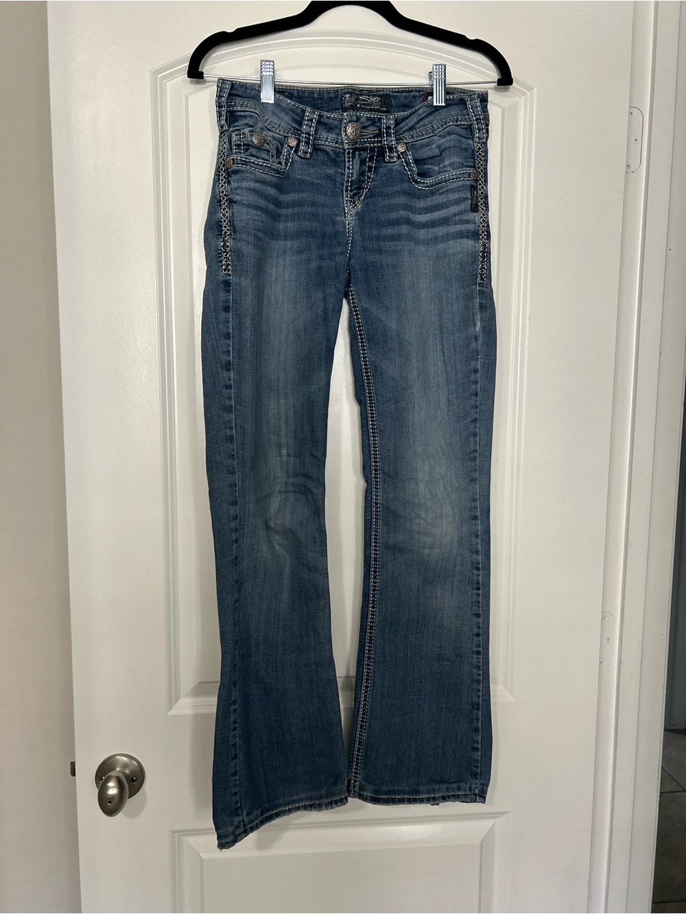 Silver Jeans Women's Medium Blue Flare Jeans with Contrast Stitching